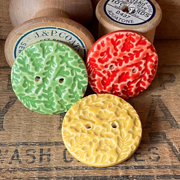 Set of three large handmade ceramic buttons