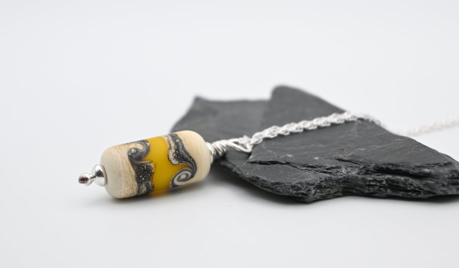ivory and yellow glass pendant necklace