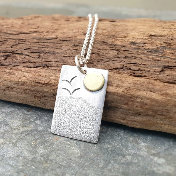 Silver textured beach scene pendant