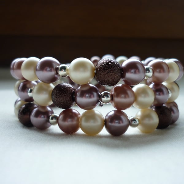 CHOCOLATE, COFFEE, CREAM AND CINNAMON MEMORY WIRE BRACELET.  771