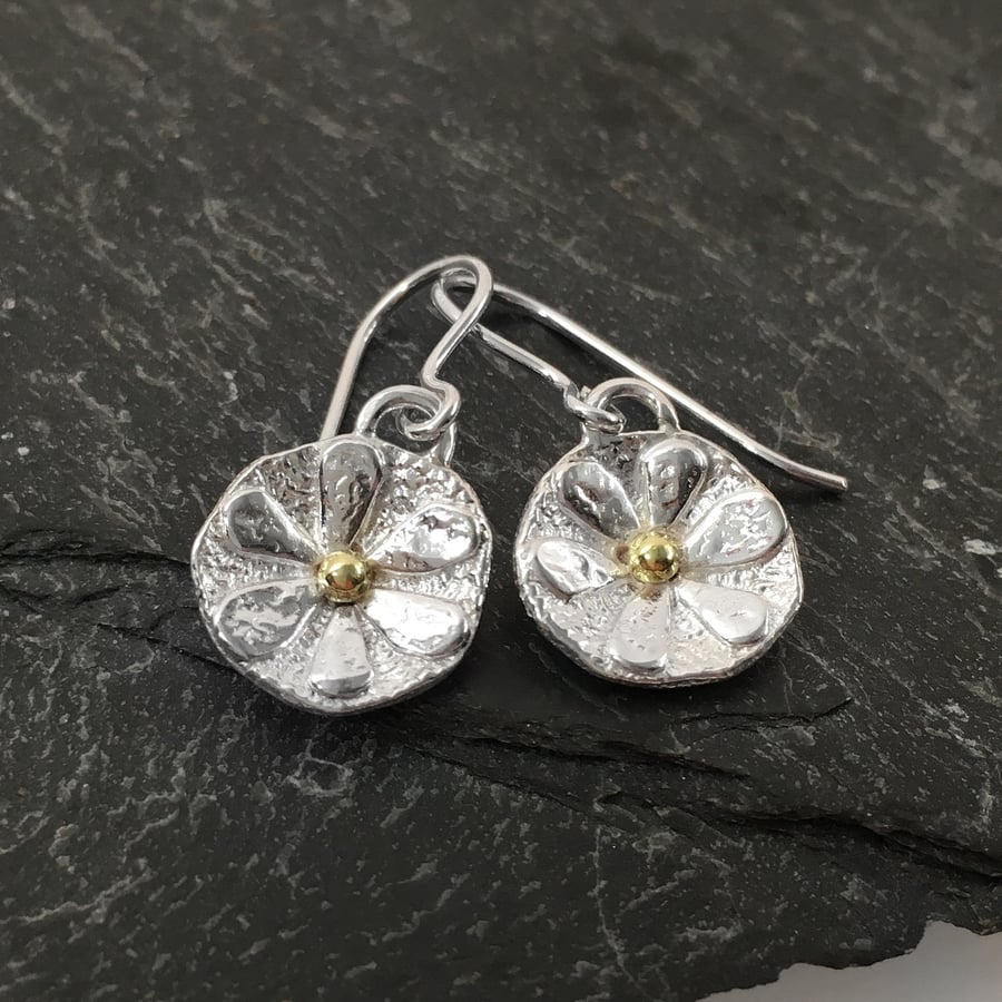 Small sterling silver flower earrings with gold centres