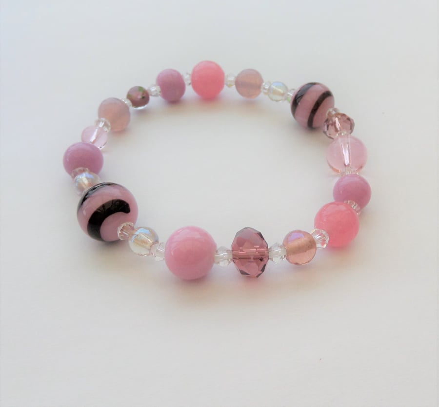Pink, lavender and clear elasticated lampwork and crystal bracelet