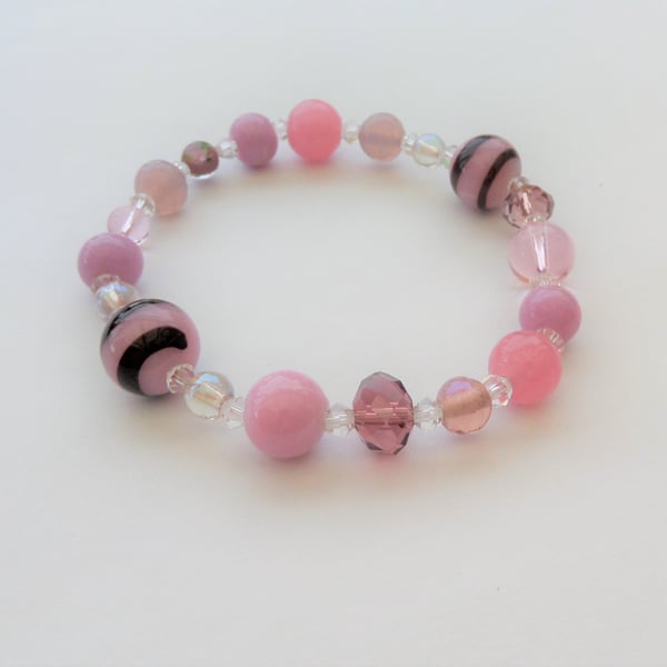 Pink, lavender and clear elasticated lampwork and crystal bracelet