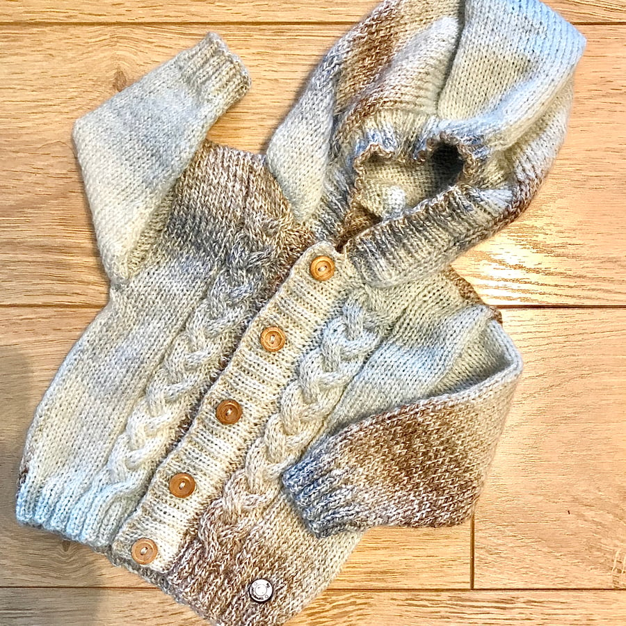 Hand knitted baby boy’s hooded cardigan to fit up to 12 months