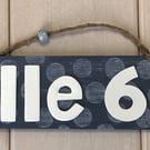Welsh Hanging "Lle 6" Door sign in navy.