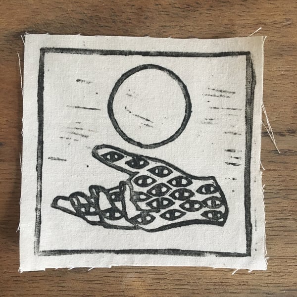 Cotton patch, She Who Knows linocut for jackets or bags.