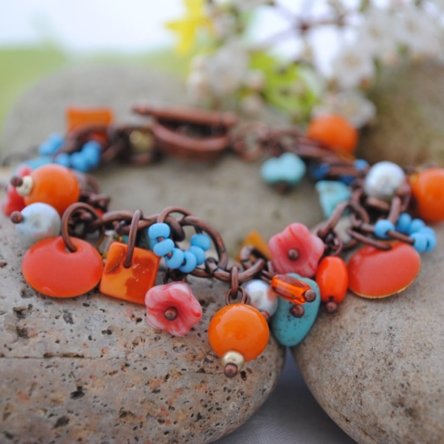 Turquoise and sunshine orange charm bracelet