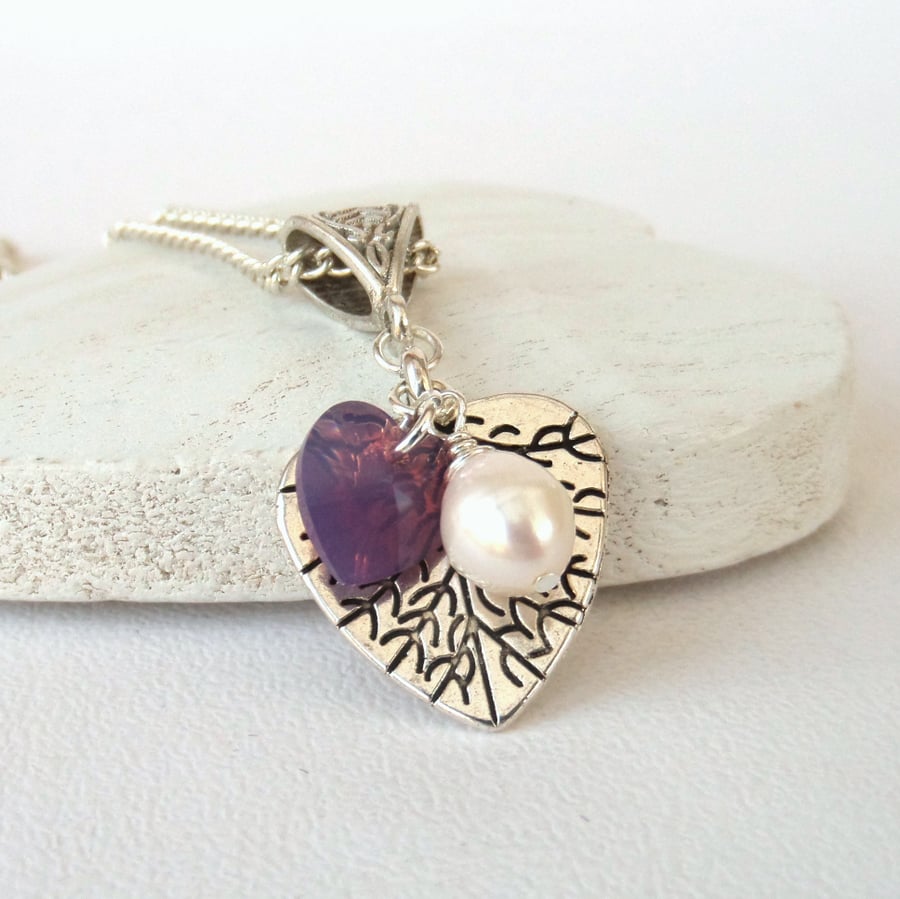 Charm necklace with pearl and purple crystal heart from Swarovski®