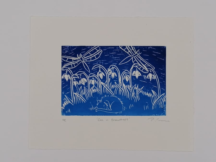"Cat in Snowdrops" lino cut print. 15 x 10 cm. Gradiated Blue on white. OE 