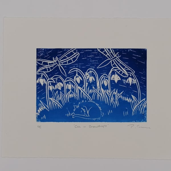 "Cat in Snowdrops" lino cut print. 15 x 10 cm. Gradiated Blue on white. OE 