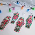 Nutcracker Christmas Decoration - hanging felt soldier motifs in red and pink
