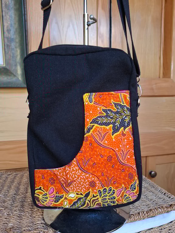 Black and orange print bag