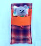 Companion bear, mini hand knitted bear in bed