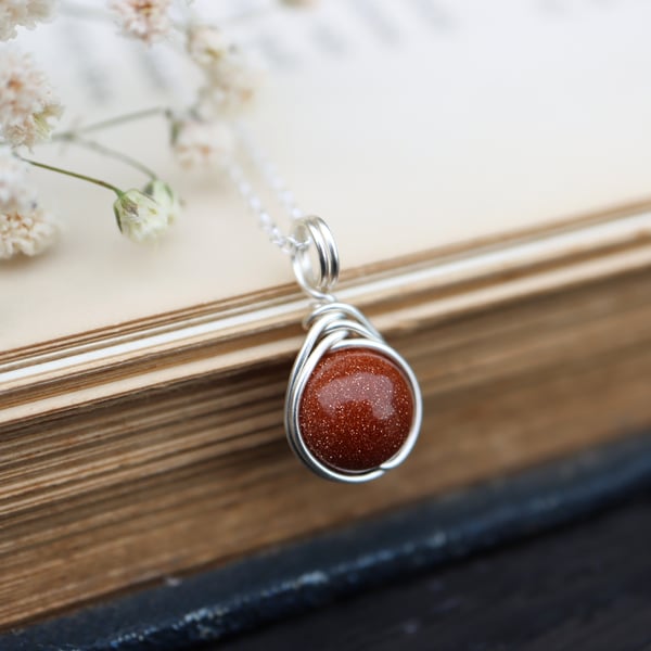 Goldstone Necklace Wire Wrapped in Sterling Silver