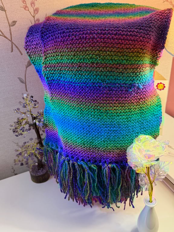 Hand knitted sparkly fringed scarf.