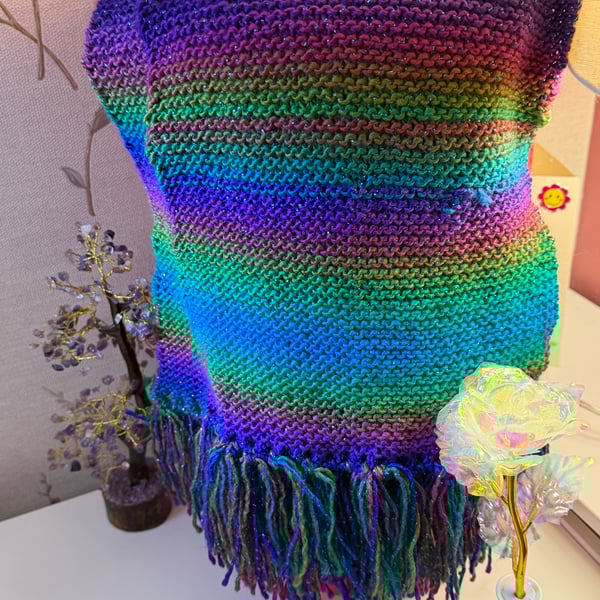 Hand knitted sparkly fringed scarf.