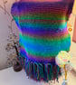 Hand knitted sparkly fringed scarf.