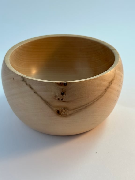 A medium sized wooden Bowl