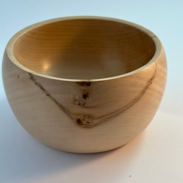 A medium sized wooden Bowl