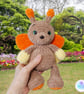 Crochet orange and yellow butterfly soft toy. Butterfly plushie. UKCA tested.