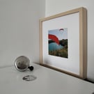 A framed and mounted print of my original artwork (Watermouth Bay)