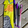 Fun animal print pen case with 4 purple pens ideal stocking filler
