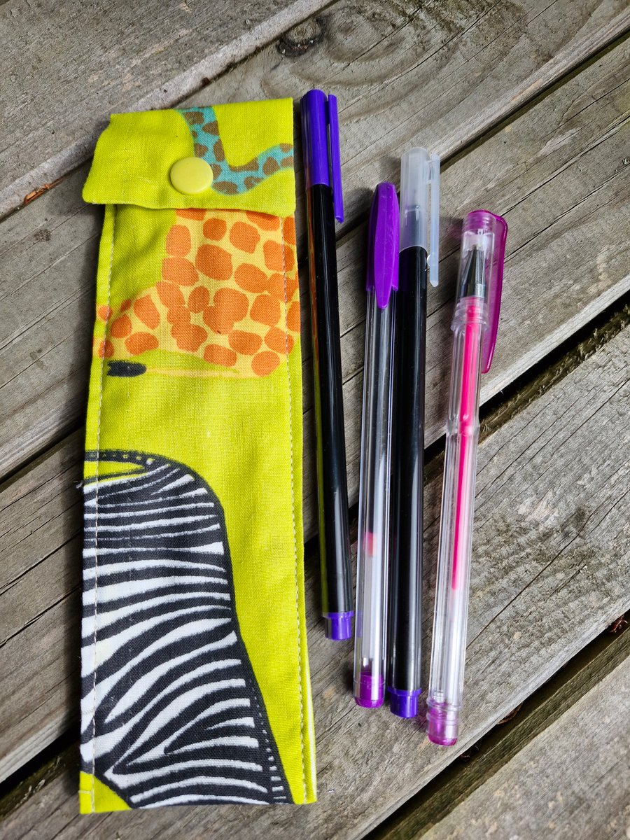 Fun animal print pen case with 4 purple pens ideal stocking filler