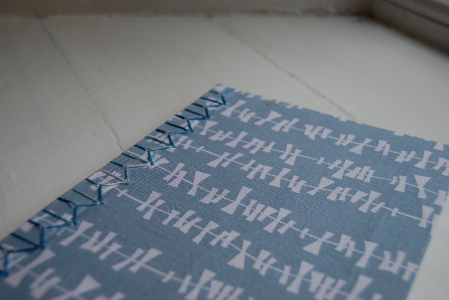 Fabric covered A5 hinged cover sketch book