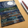Full moon seascape embroidered notebook. 