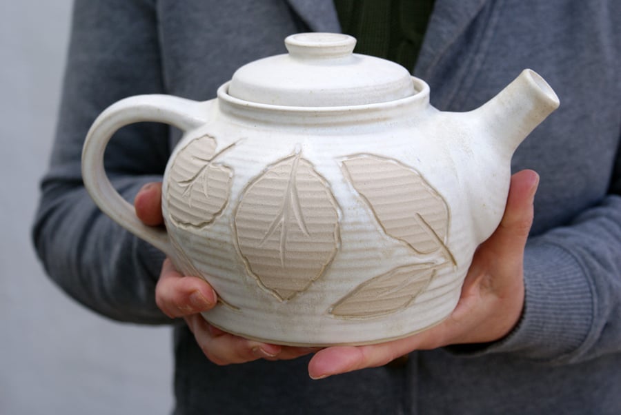 Hand thrown stoneware teapot with leaf design - glazed in vanilla cream