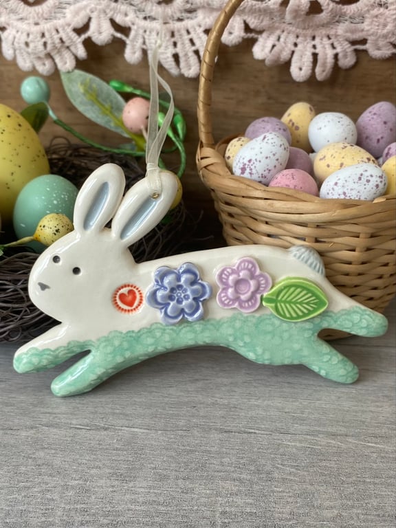 Ceramic Leaping Bunny decoration with flowers turquoise