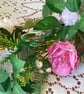 Handmade floral multi coloured, multi flowered garland table decoration. - Image 7