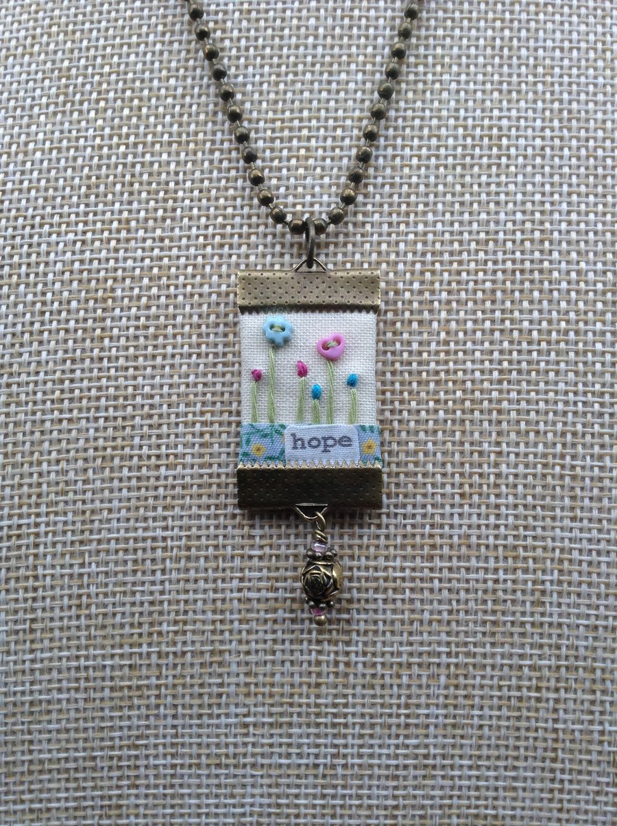 Hand sewn pendant necklace