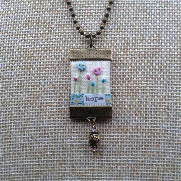 Hand sewn pendant necklace