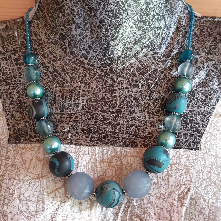 Polymer clay necklace in turquoise, black and silver 