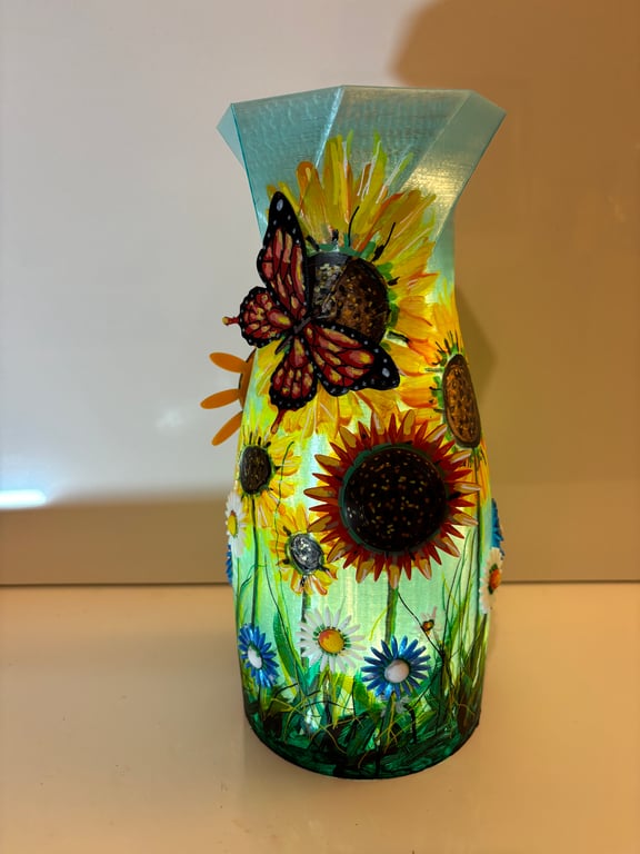 A large hand painted and sealed sunflower vase by Andrew Jenkins