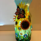 A large hand painted and sealed sunflower vase by Andrew Jenkins