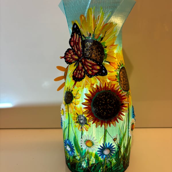 A large hand painted and sealed sunflower vase by Andrew Jenkins