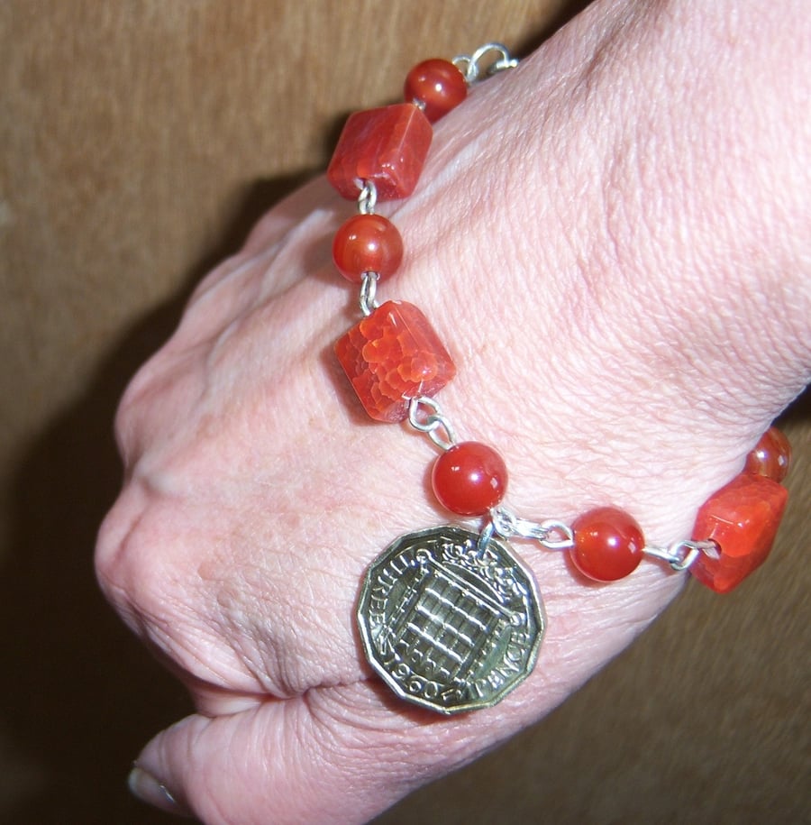 Bracelet with carnelian stones with recycled 3d coin charm