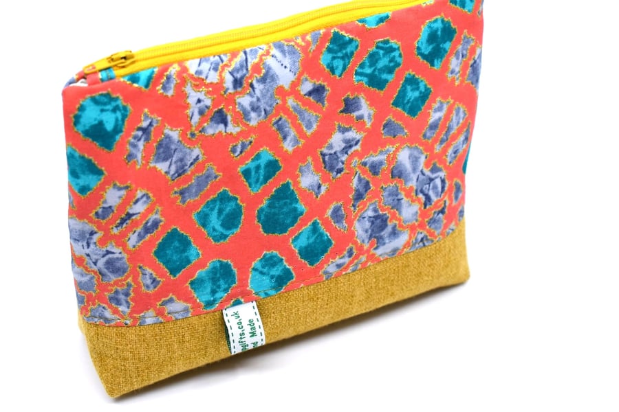 For your bits and pieces a glittery zip pouch ready for handbag or holiday case.