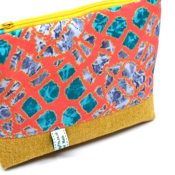 For your bits and pieces a glittery zip pouch ready for handbag or holiday case.