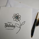 Happy Birthday to a special friend - silver flower with blue dew drop centre 