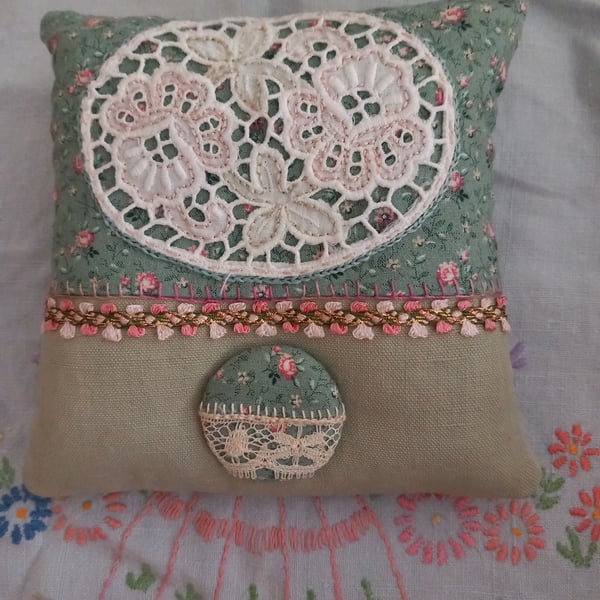 The Green Lavender Mini Pillow, with a handmade button