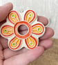 Intricate ceramic flower decoration orange - Image 3