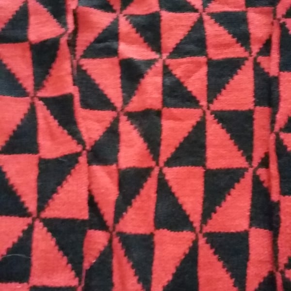 Geometric jumper in black and rust acrylic size 7-8 years. Seconds Sunday