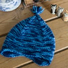 Pixie baby hat - hand knit little pixie style hat with ear flaps and a tassel