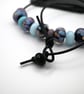 black, blue and purple lampwork glass leather cord necklace - Image 4