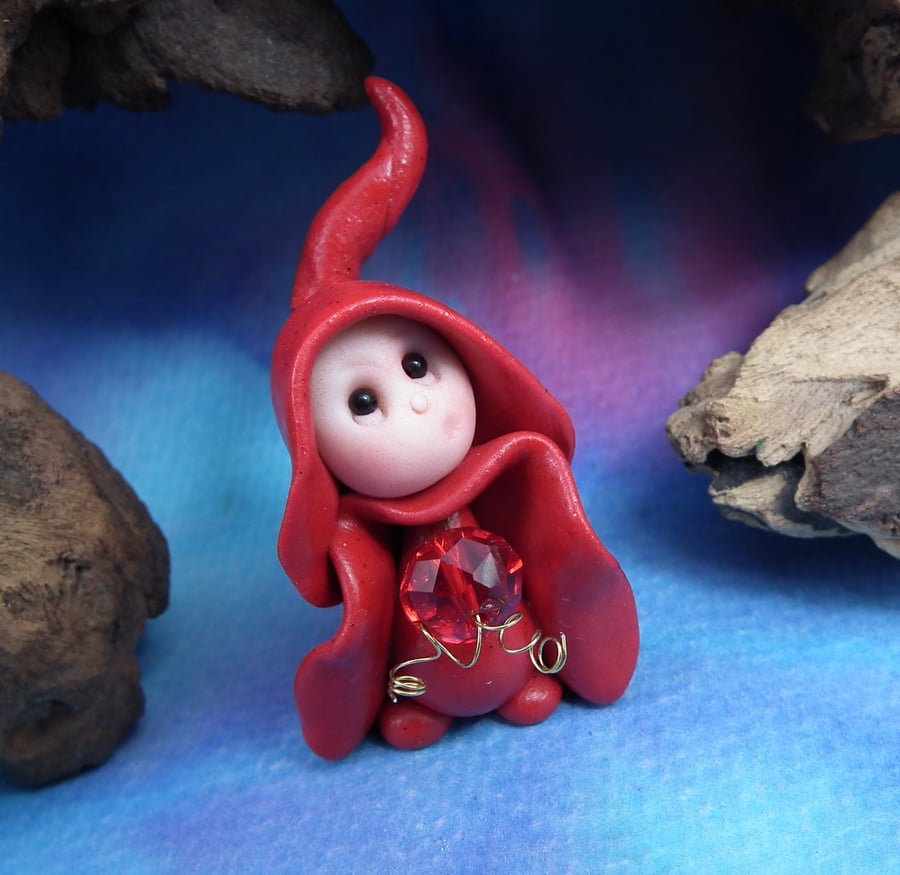 Reserved Listing       January Garnet OOAK Sculpt by Ann Galvin