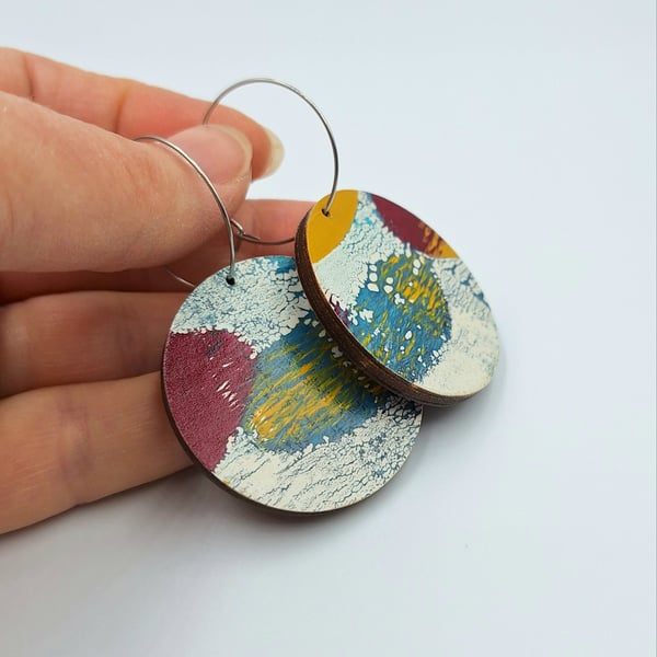 Hand printed patterned earrings, reversible, in red, blue, mustard and white