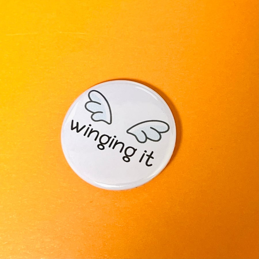 Winging it badge. Positivity badge, pocket pebble, magnet or keyring.